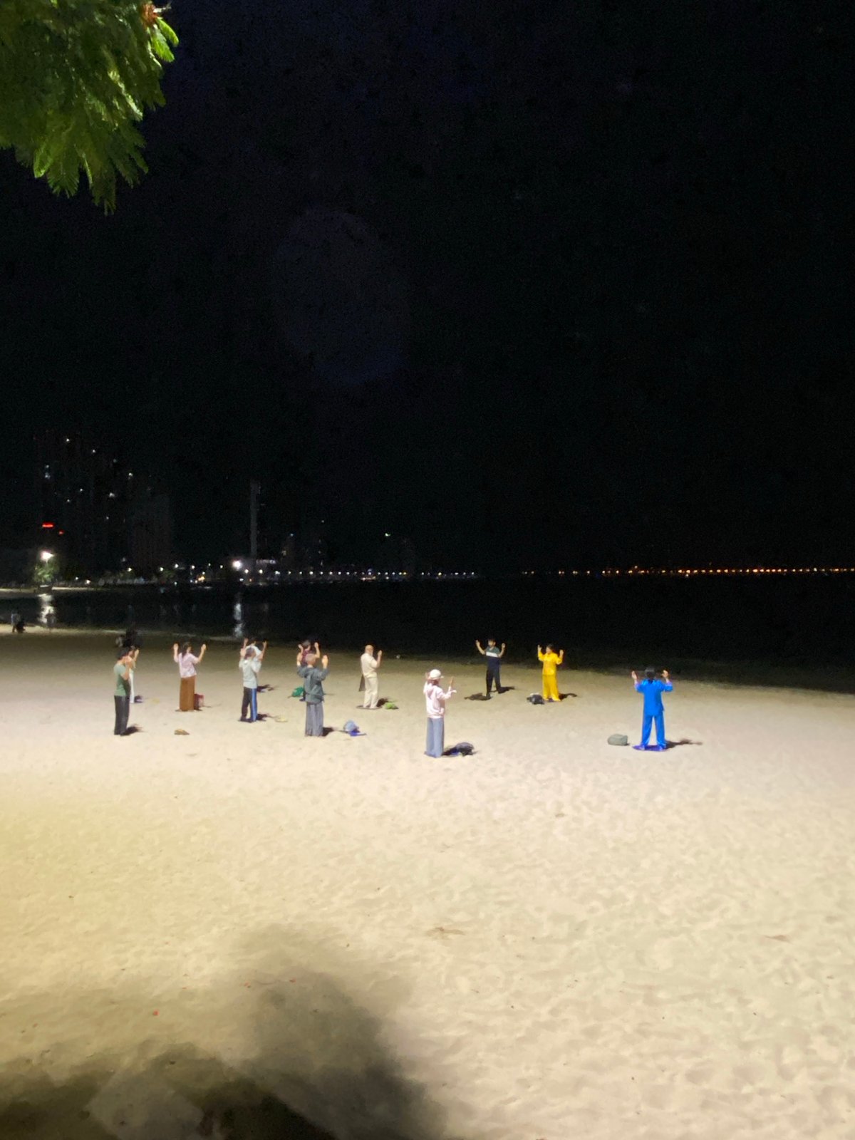 Late-night Tai Chi session on Nha Trang's beachfront