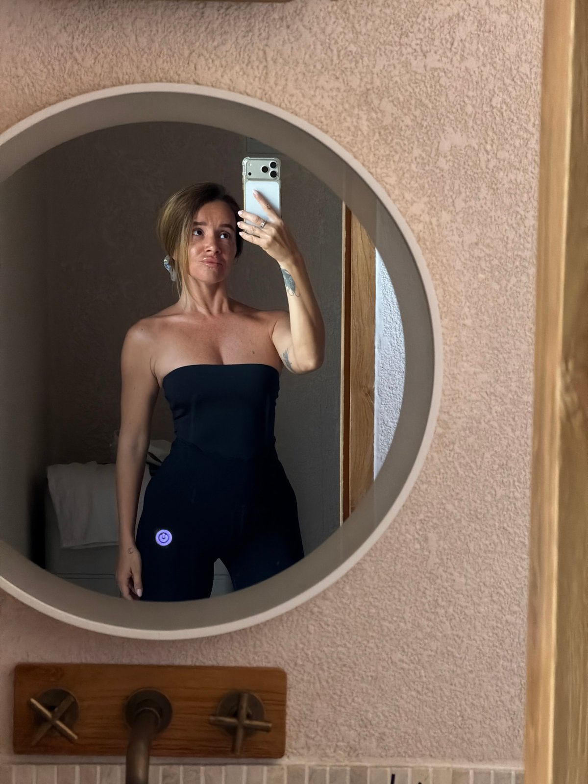 Back-to-back bathroom mirror selfies in Mengwi, Bali