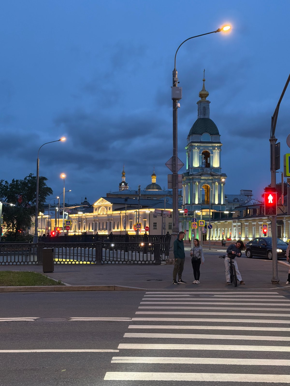 Evening scenes captured in Podolsk featuring cathedral and streetscape