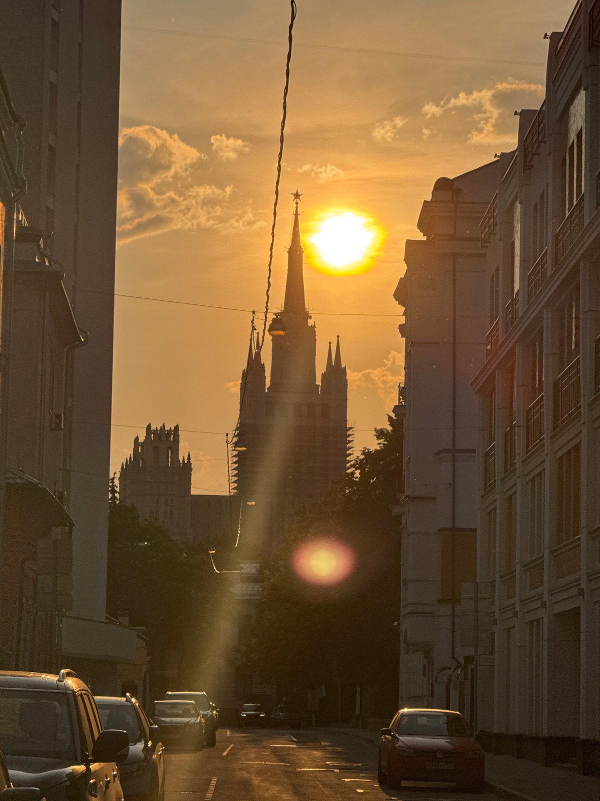 Moscow afternoon: sunset streets, cinema posters, traffic, government buildings