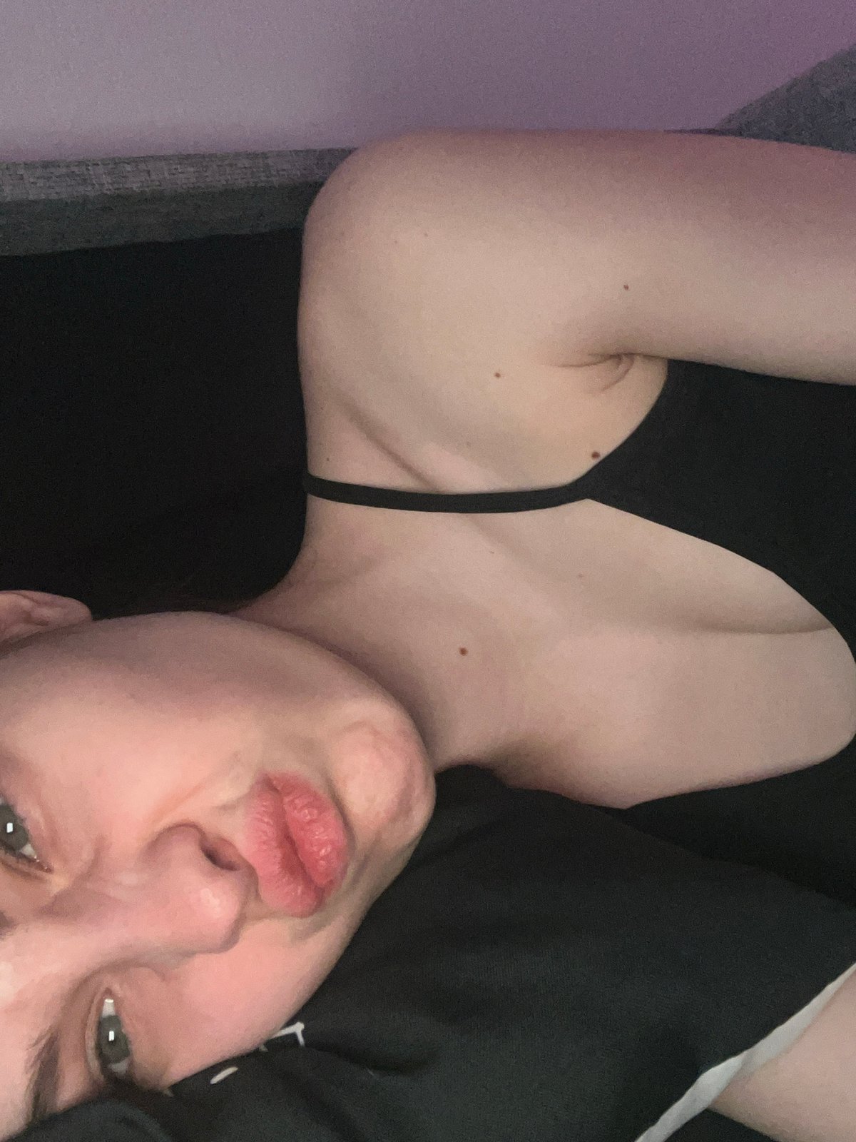 Person relaxing on blanket in Saint Petersburg apartment