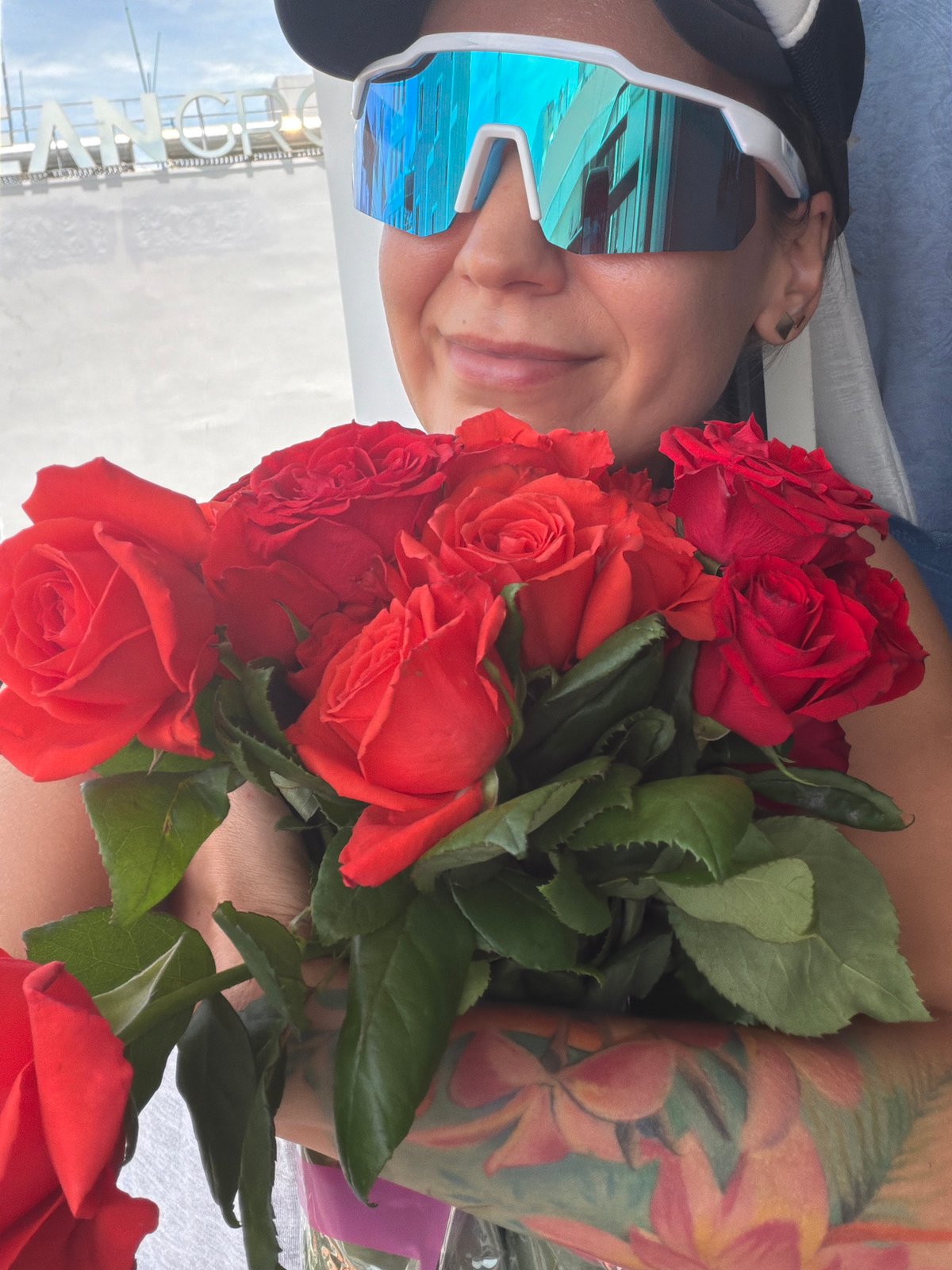 Red roses and reflective shades in Nha Trang