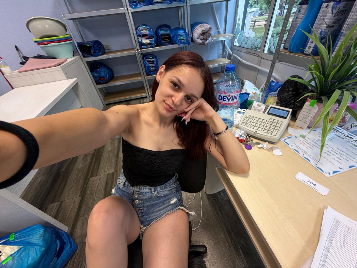 Selfie session at a Sofia laundromat, mid-afternoon.