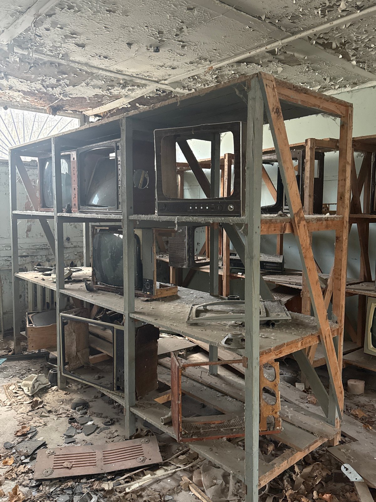 Abandoned televisions documented in decaying Pryp'yat' building