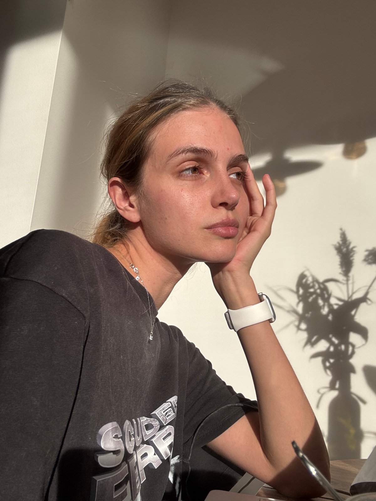 Women document casual indoor moments across afternoon timespan