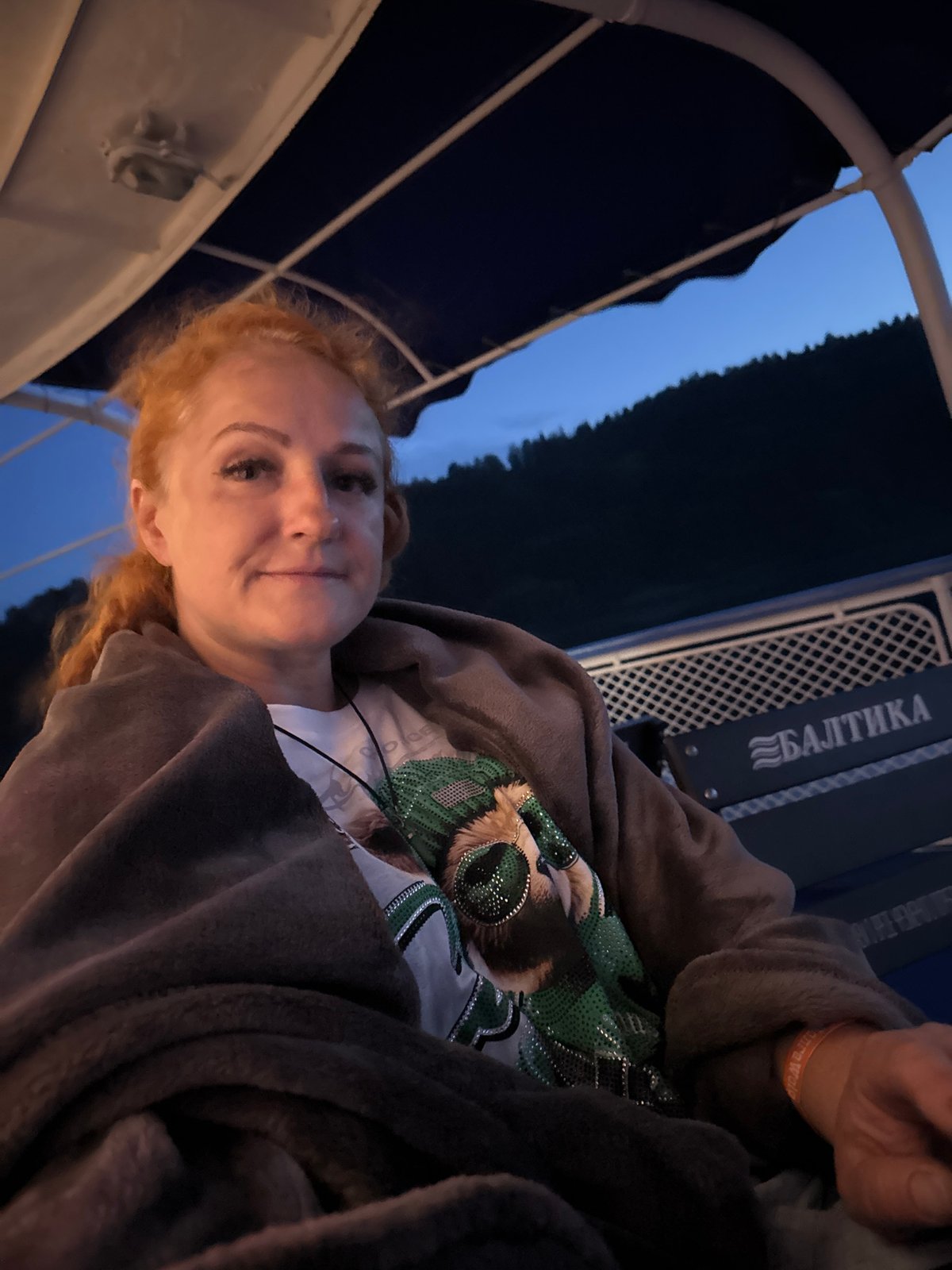 Evening boat hangout in Doksha with drinks and dark skies