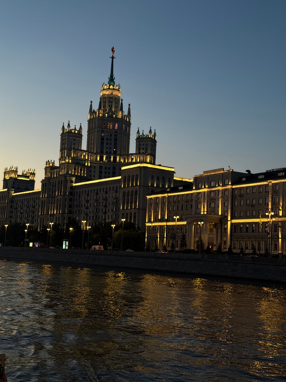 Moscow's Stalinist skyscraper lit up at dusk