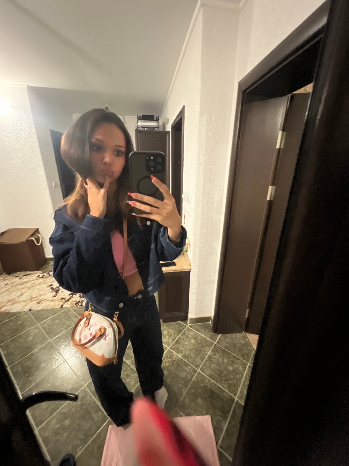 Mirror selfies in a Zlatograd hallway before heading out