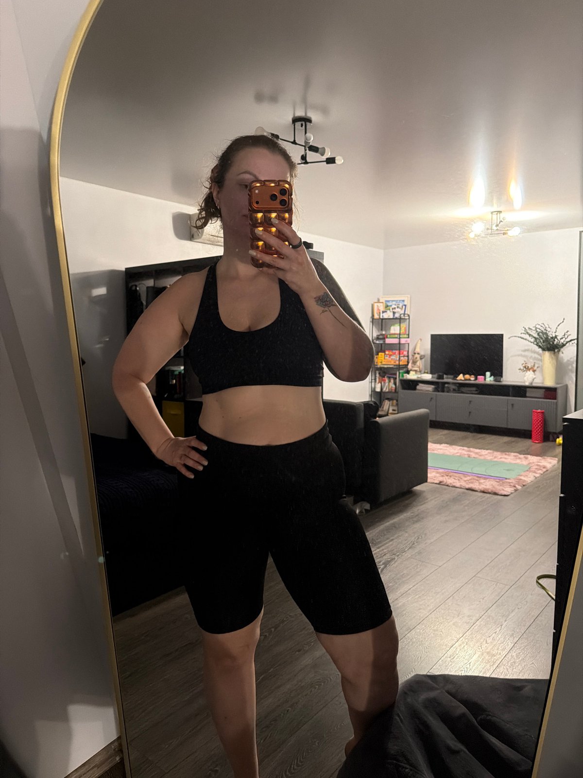 Woman takes workout selfies at home in Moscow