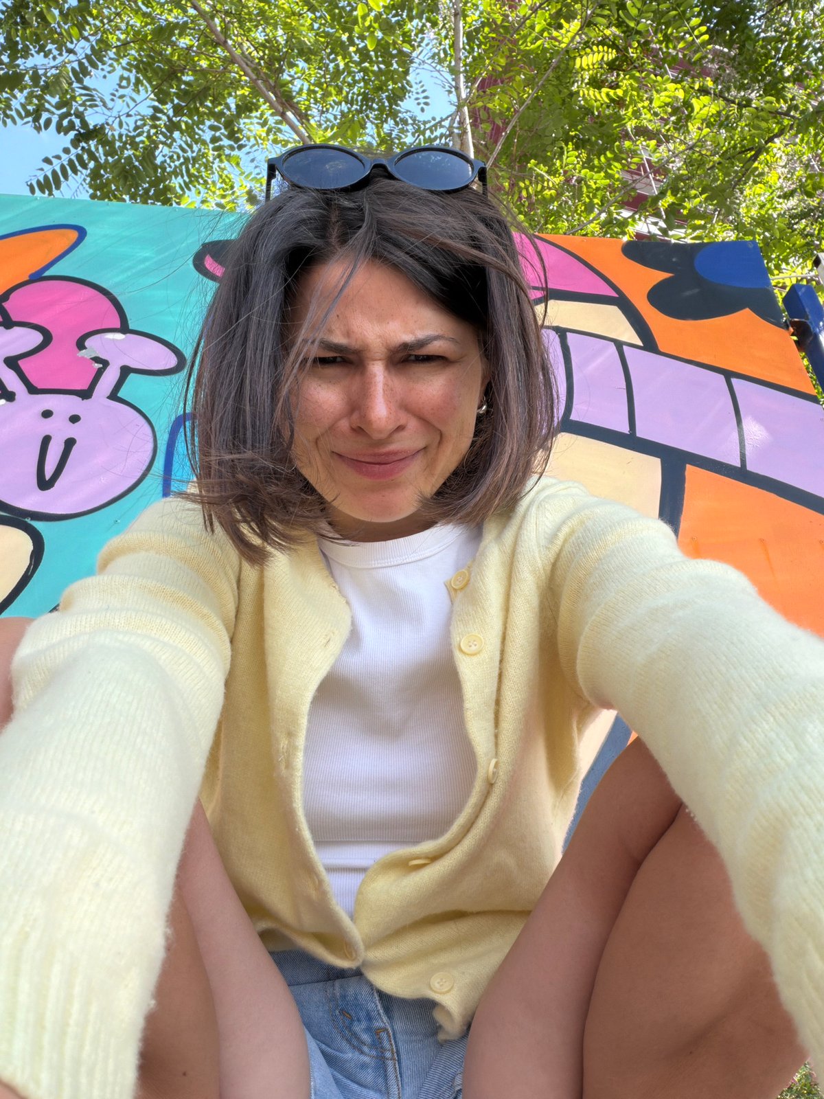 Woman takes morning selfies at Montenegro beach resort