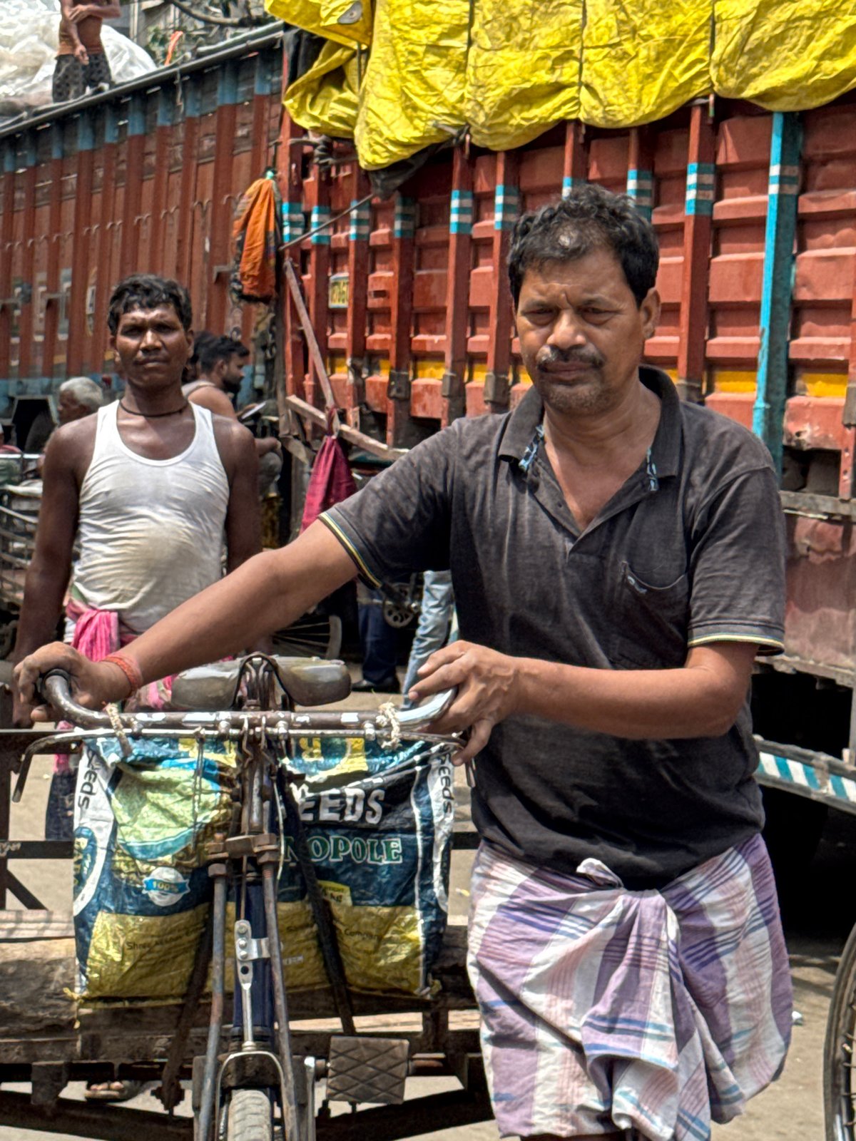 Early morning street life documented across Kolkata neighborhoods