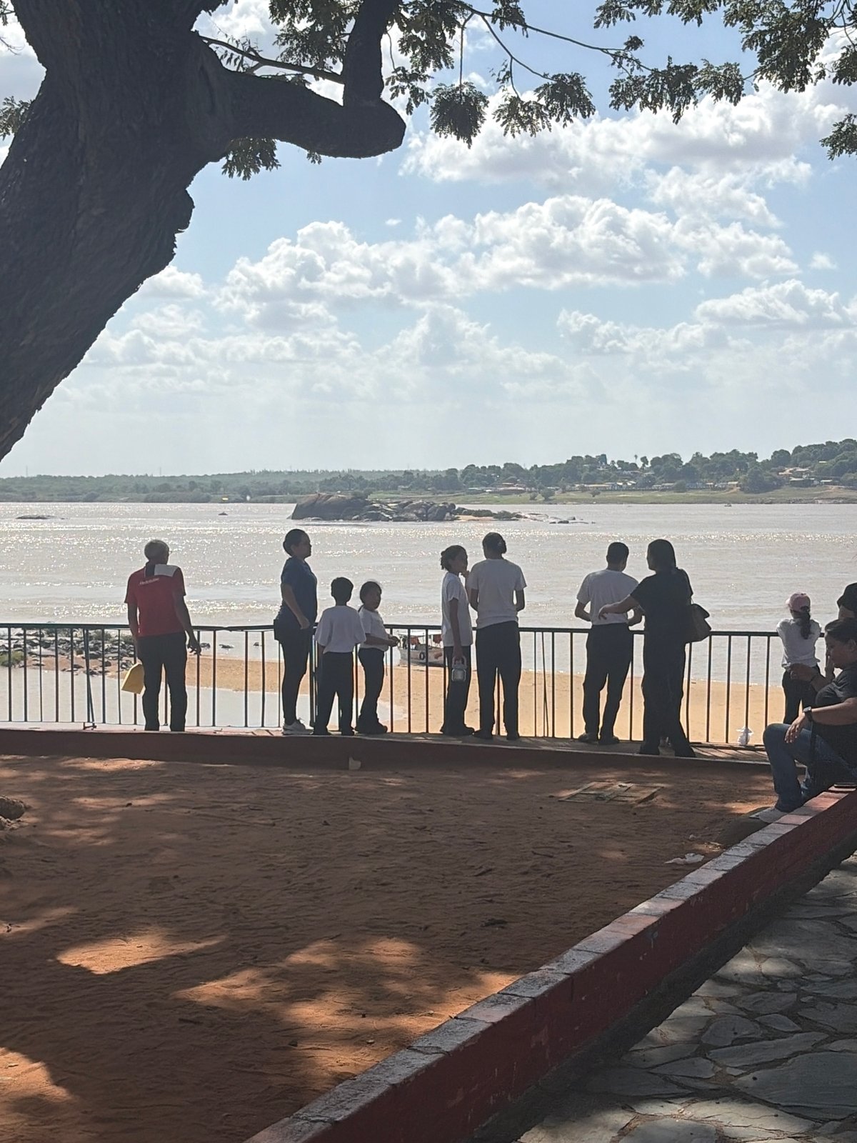 Evening riverside leisure activity observed in Ciudad Bolivar, Venezuela