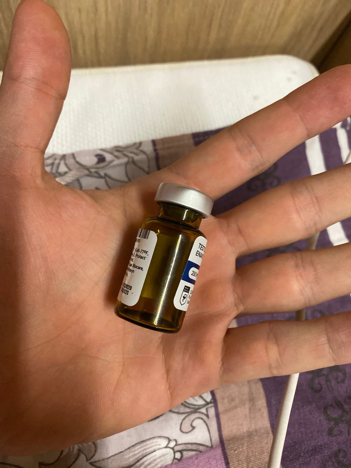 Man photographed with amber vial in Koskolovo, Russia