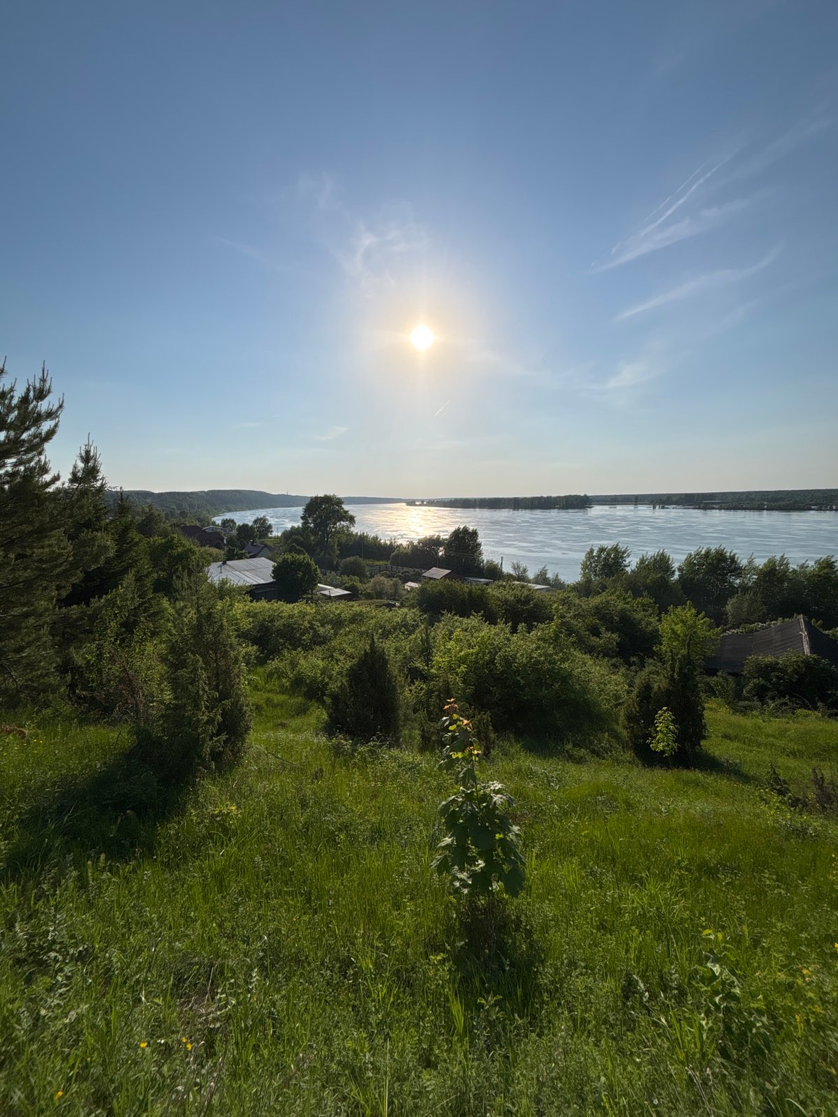 Afternoon riverside gathering documented in Ольховка, Russia