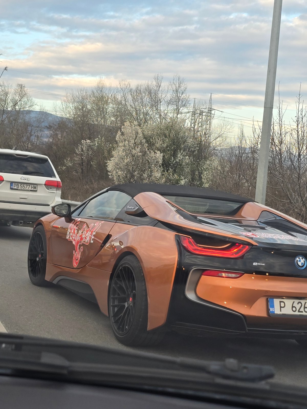 Orange BMW i8 convertible spotted in Plovdiv traffic