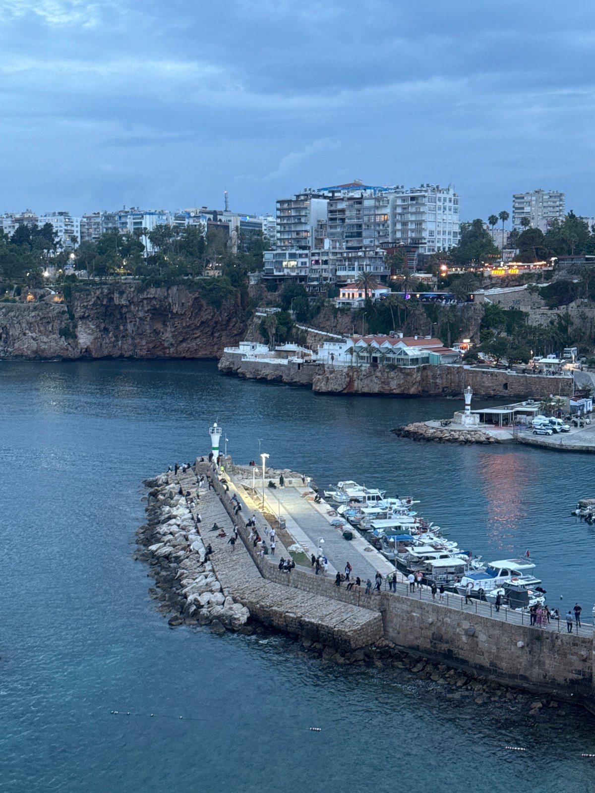 Evening scenes documented around Antalya harbor and coastline