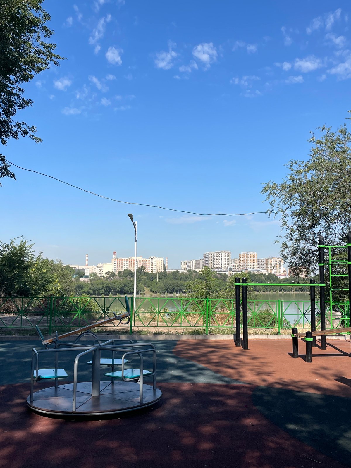 Quiet summer morning across Almaty parks, streets, and playgrounds