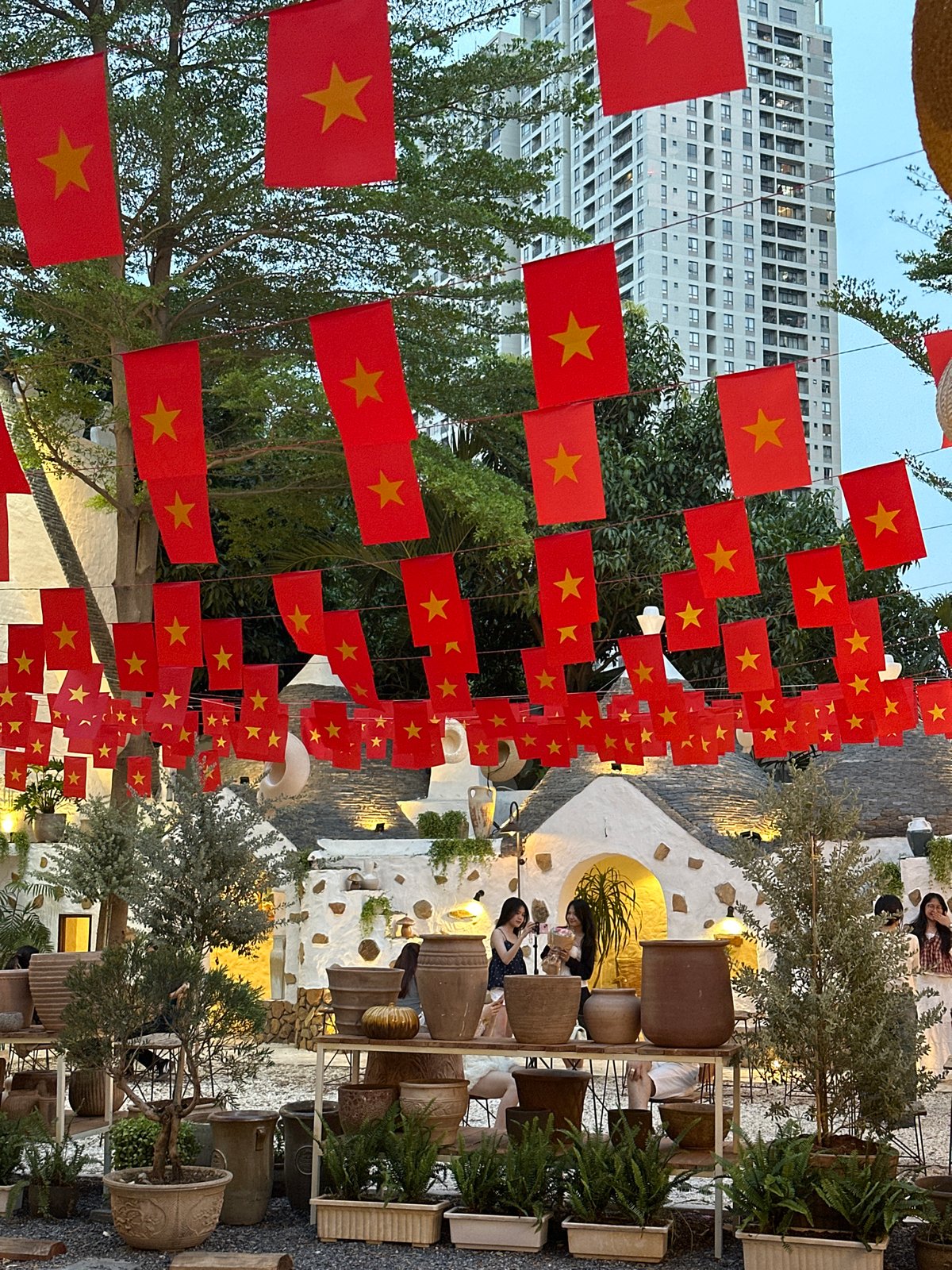 Vietnamese flags decorate Italian-style café district in Thủ Đức