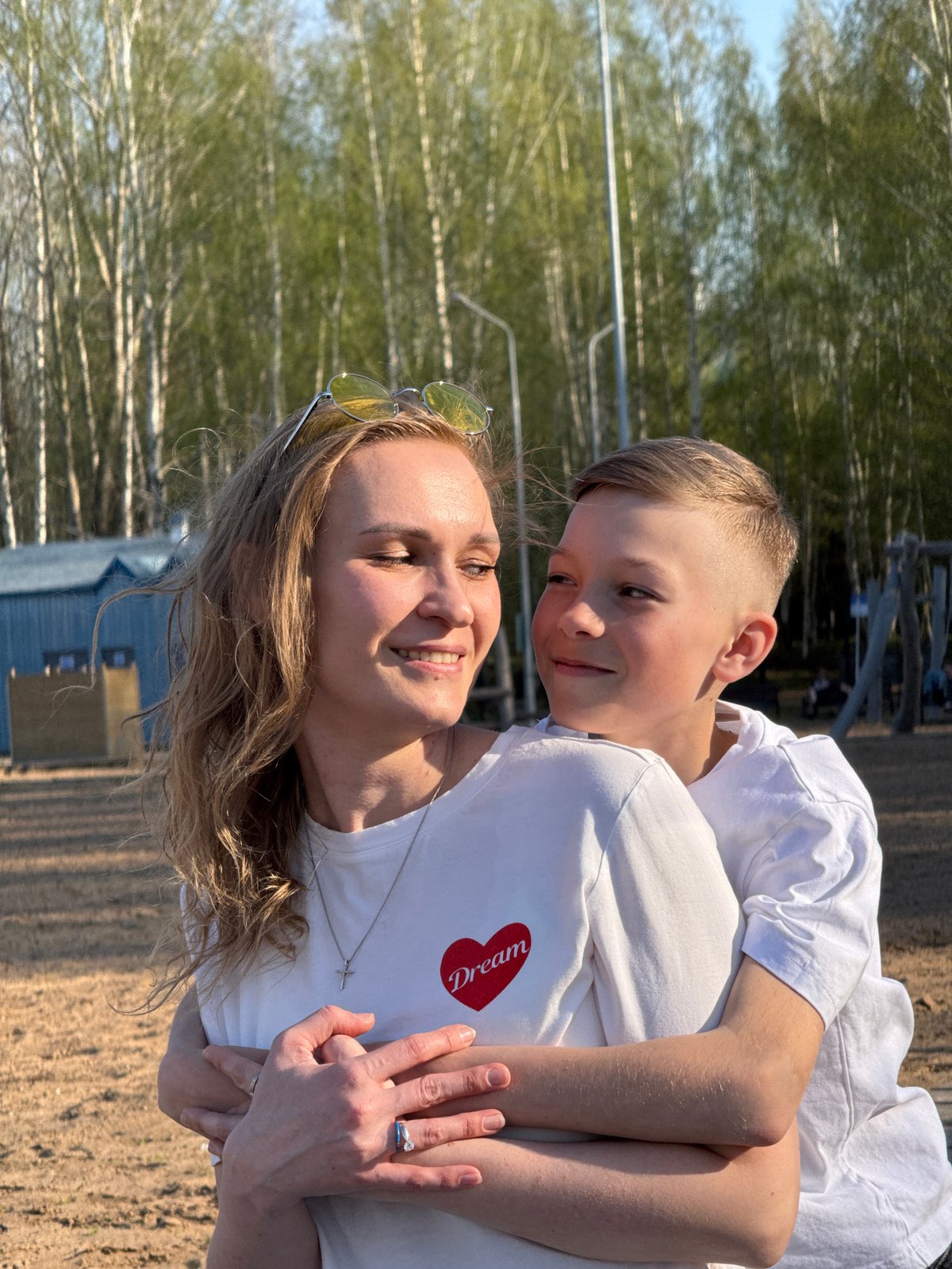 Mother and son enjoy beach outing in Chaikovsky, Russia