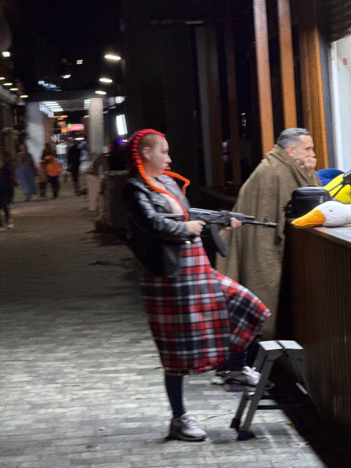 Evening scenes documented across Sochi including street performer, statues