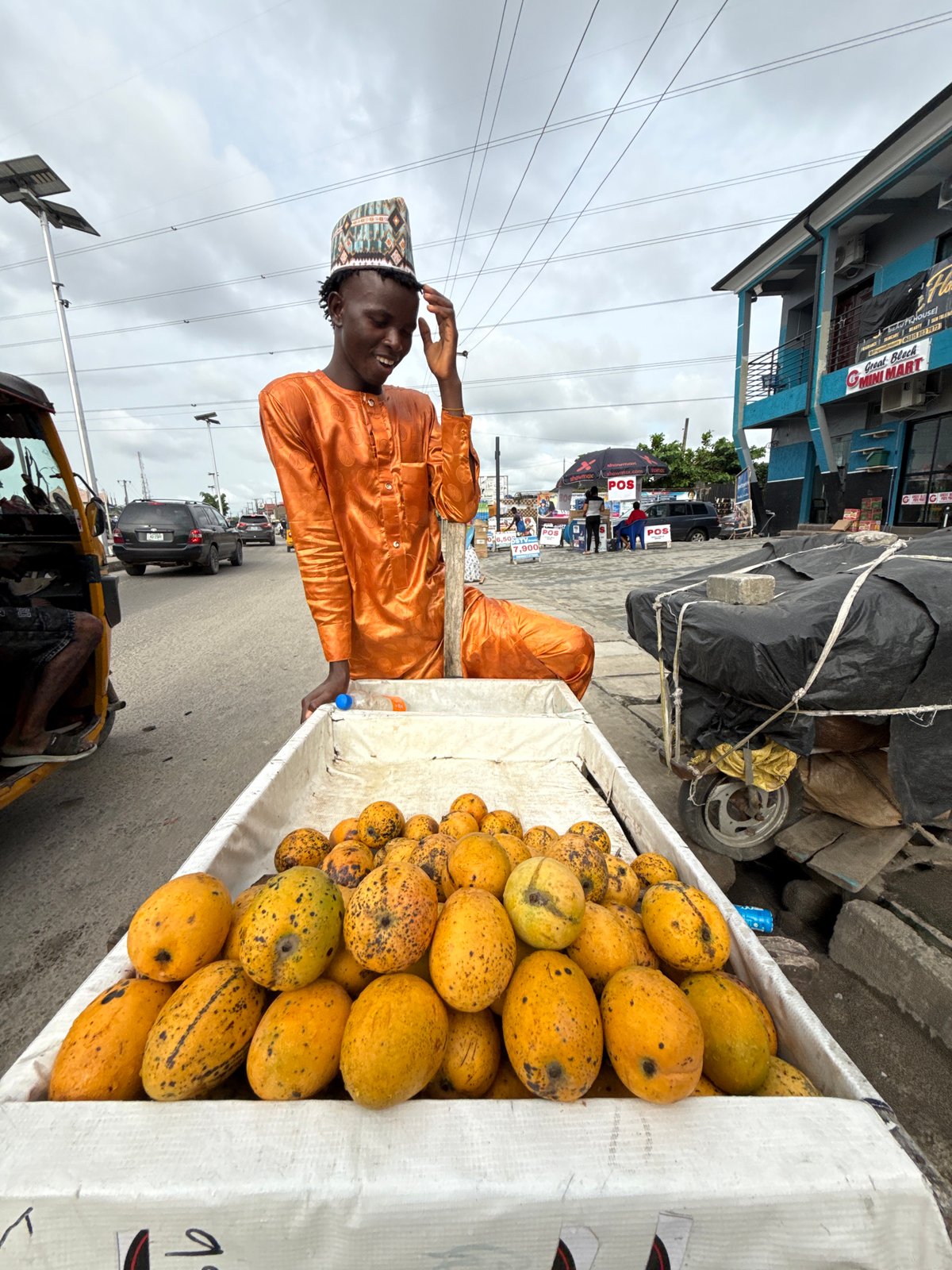 Daily life unfolds on streets of Ado, Nigeria