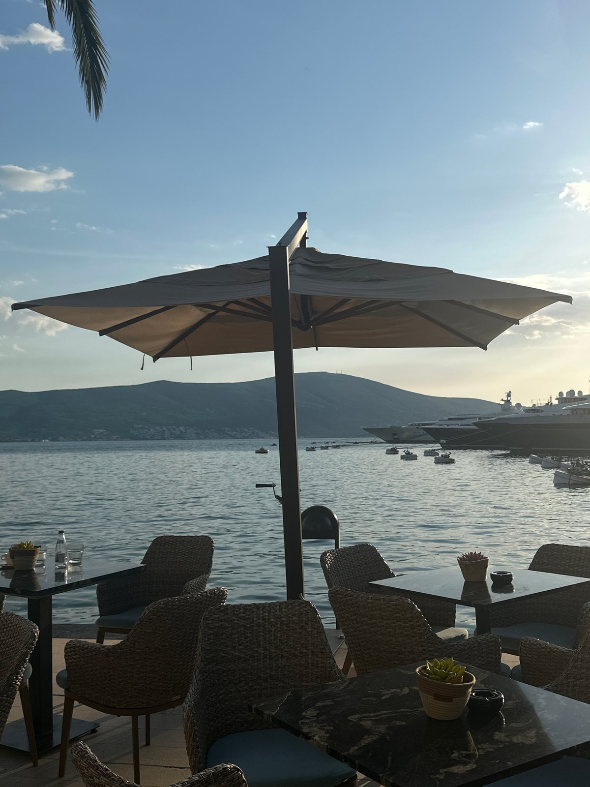 Casual dining captured at waterfront restaurants in Tivat, Montenegro