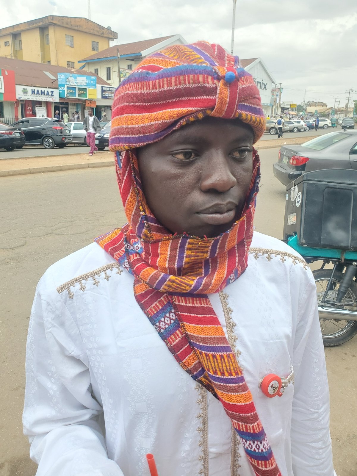 Person in traditional dress spotted on Jos street