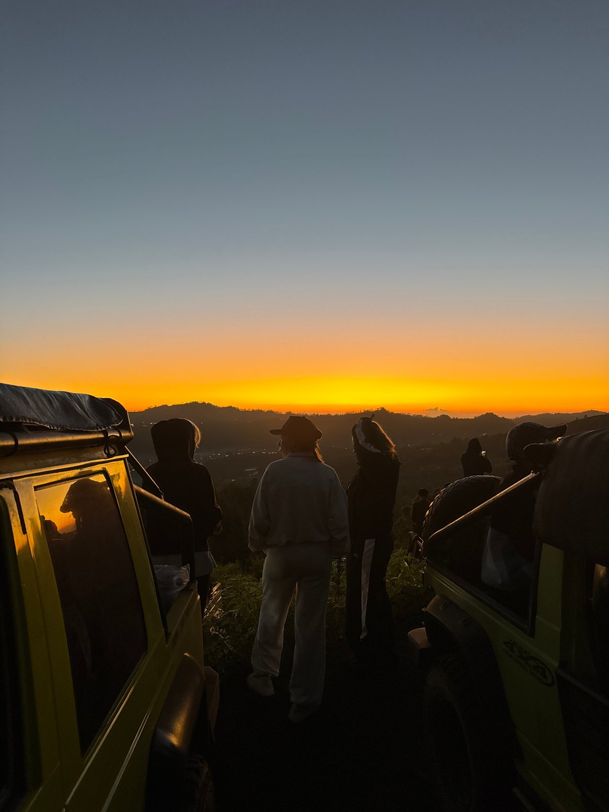 Jeep rooftop sunset watching at Kintamani's volcanic viewpoint