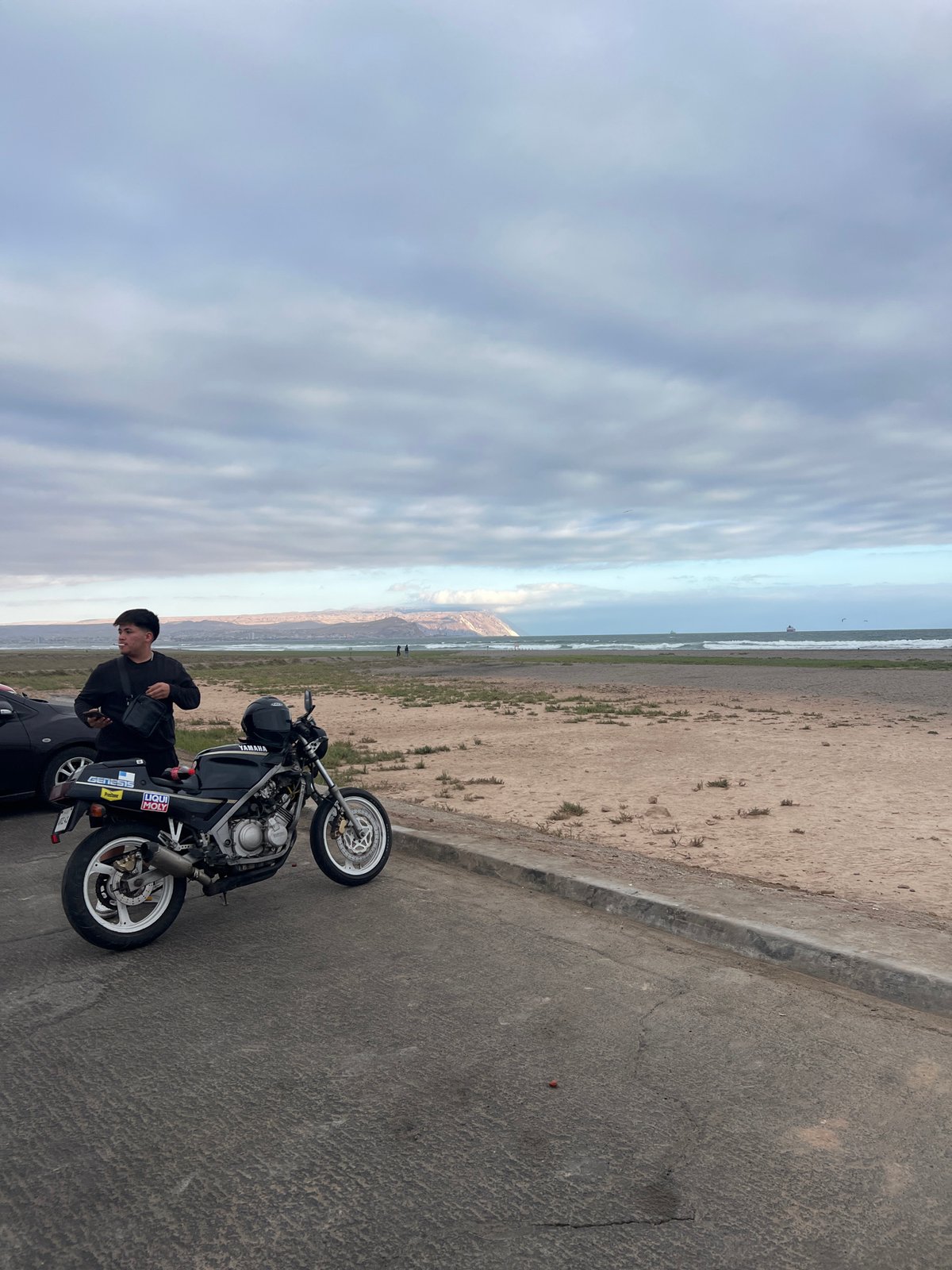 Cloudy evening on the Arica coast, beach and food truck scene