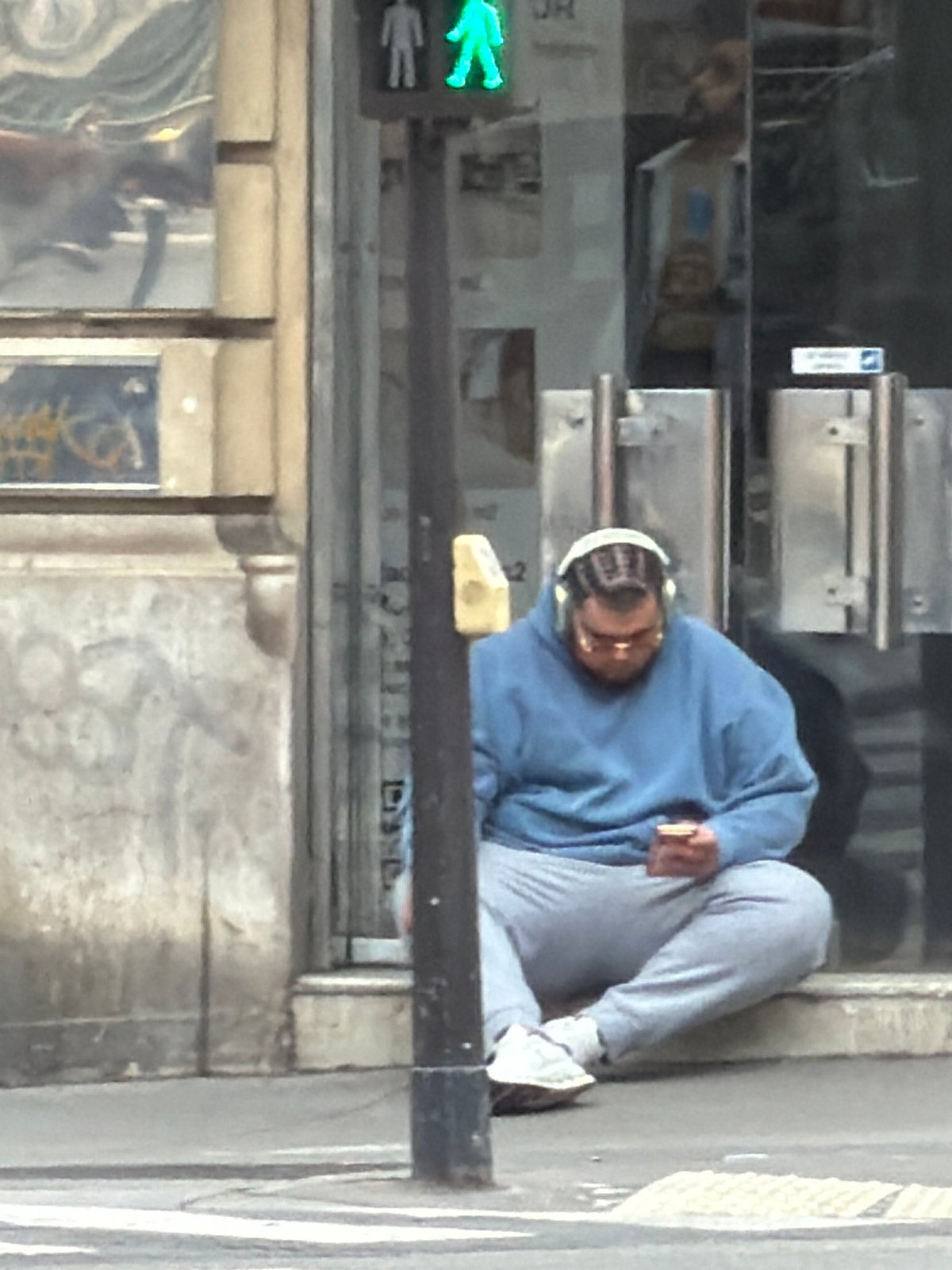 Ordinary street life documented across central Paris Friday afternoon