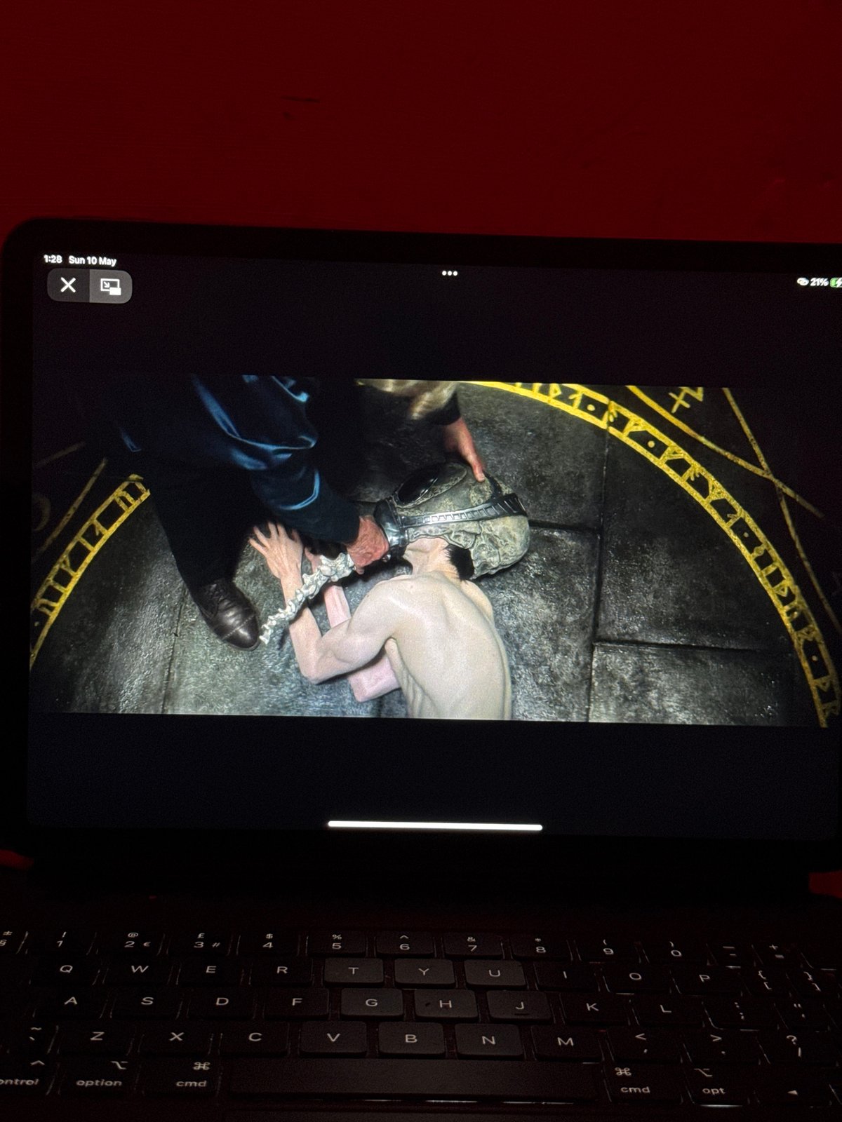 Tablet displays helmet scene in Sofia office setting