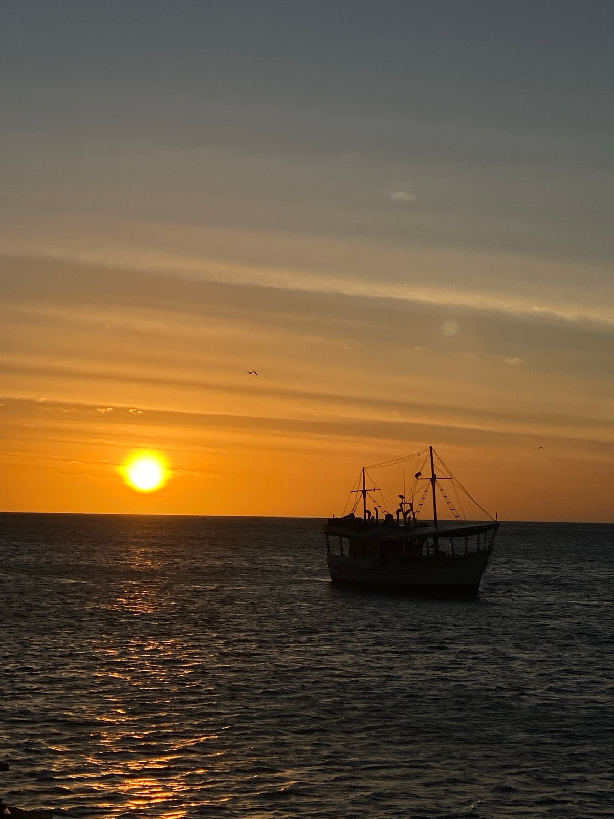 Crowds gather for sunset viewing at Juan Griego waterfront