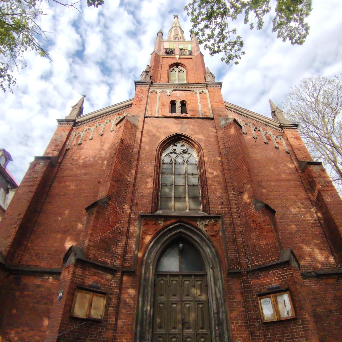 Tourist documents walking tour of Riga's historic Old Town