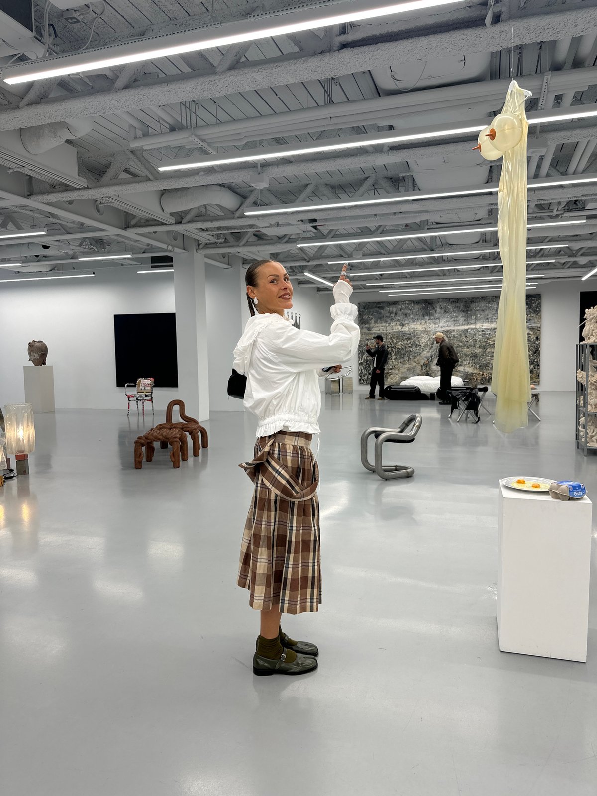 Contemporary art exhibition documented by visitors in London gallery