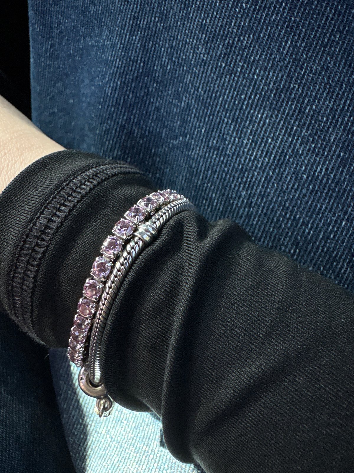 Person photographed wearing silver bracelets in Plovdiv, Bulgaria