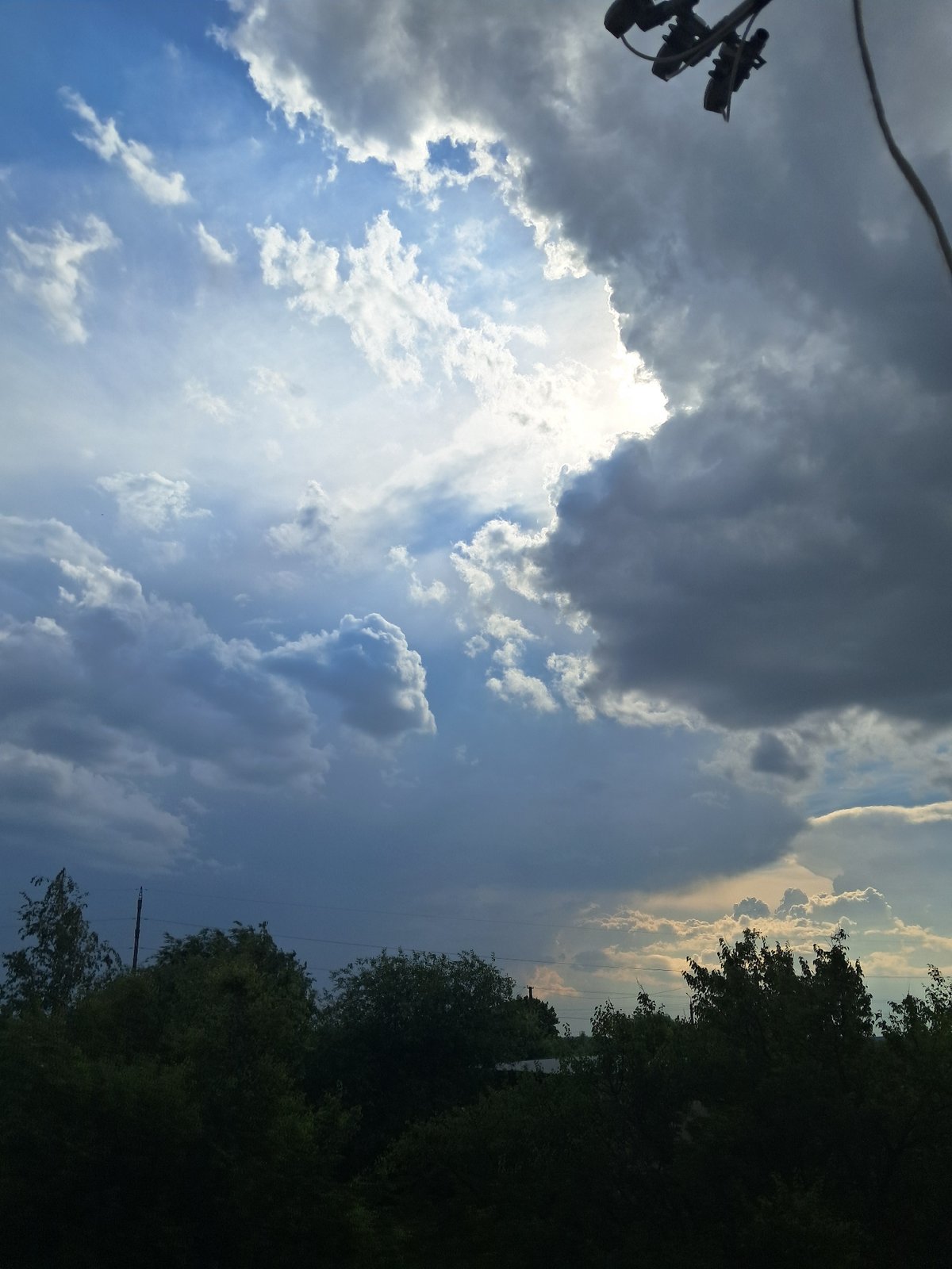 Religious artifacts and summer skies in Smila, Ukraine