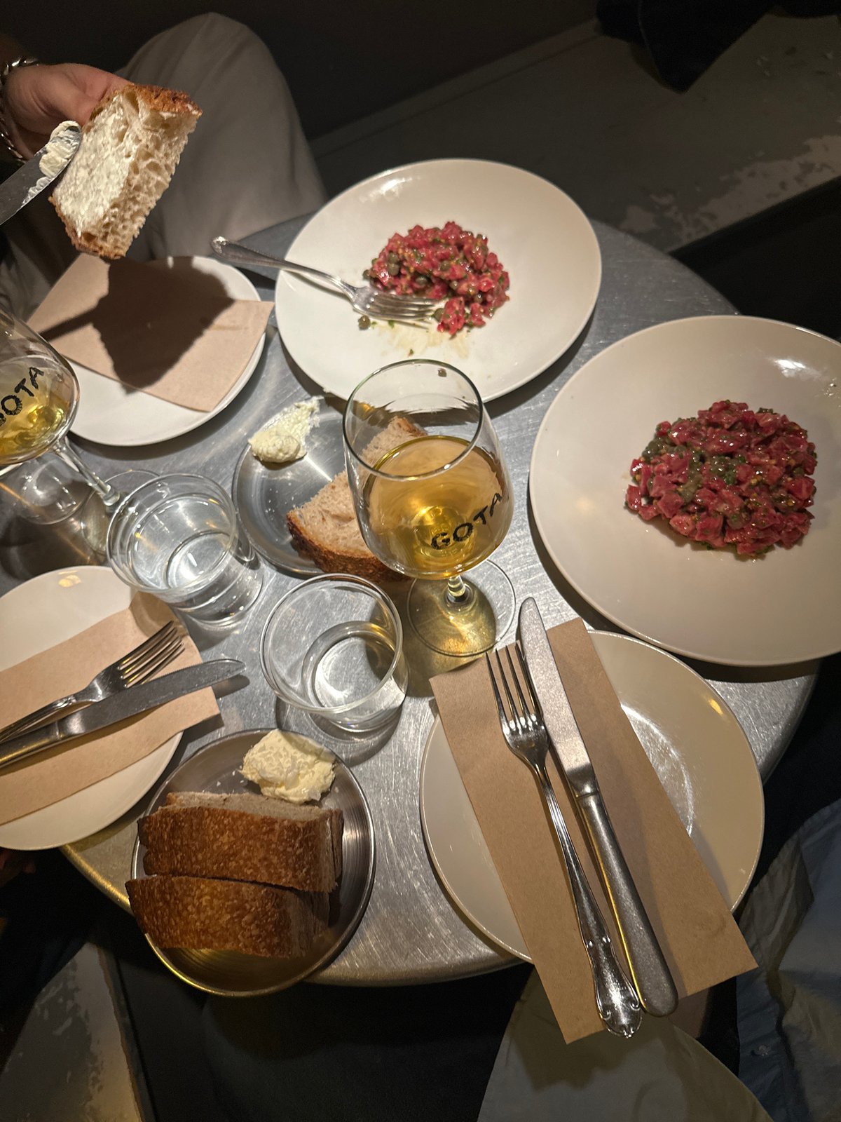 Dinner documented at Madrid restaurant through evening meal progression