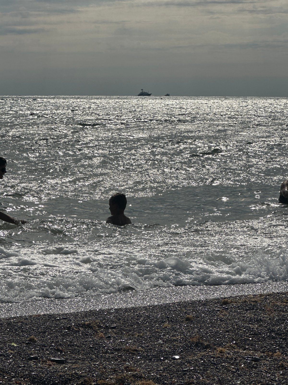 Black Sea pebble beach, choppy waves and a quiet afternoon