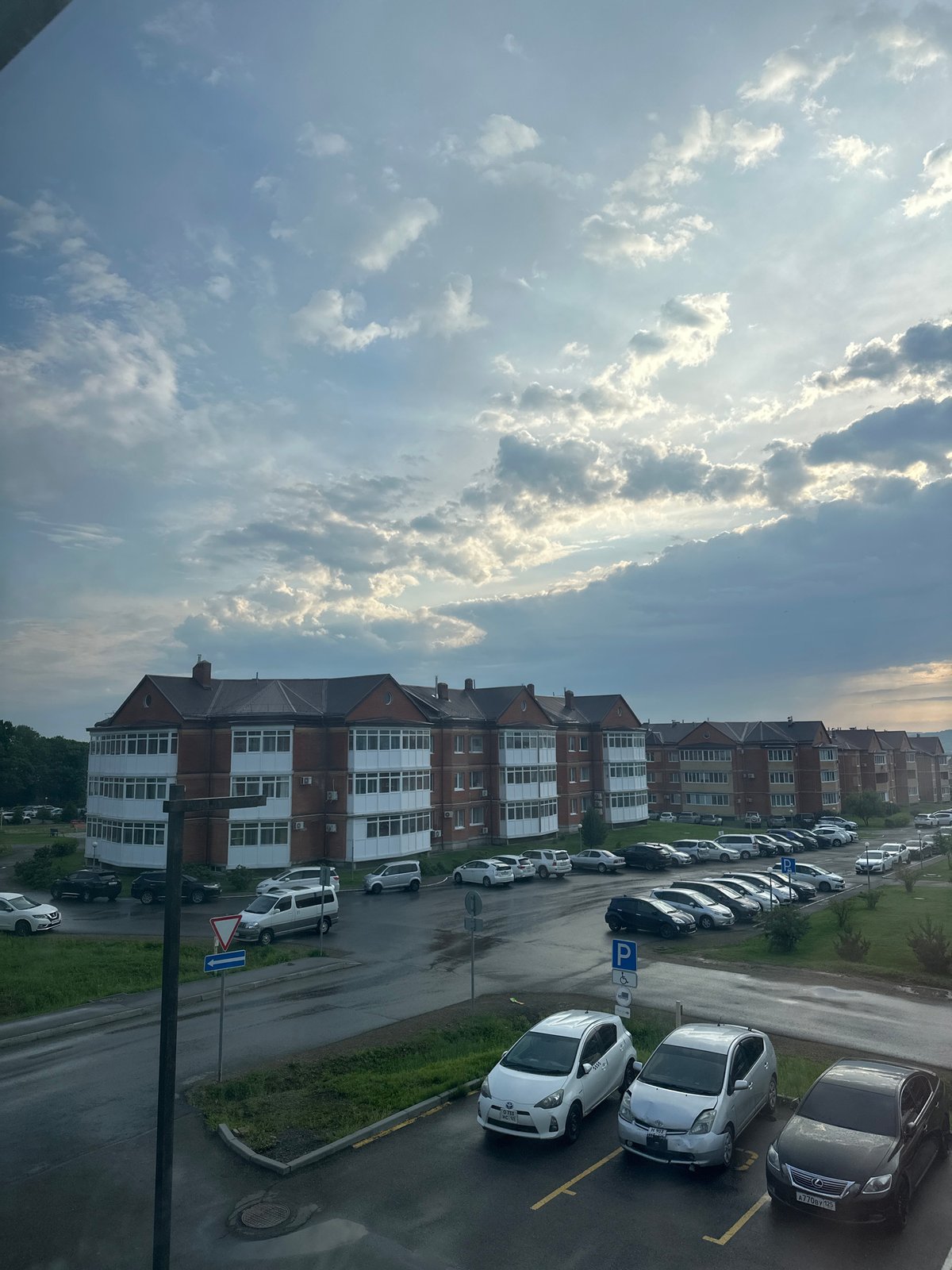 Everyday scenes documented in Ussurijsk including biplane sighting
