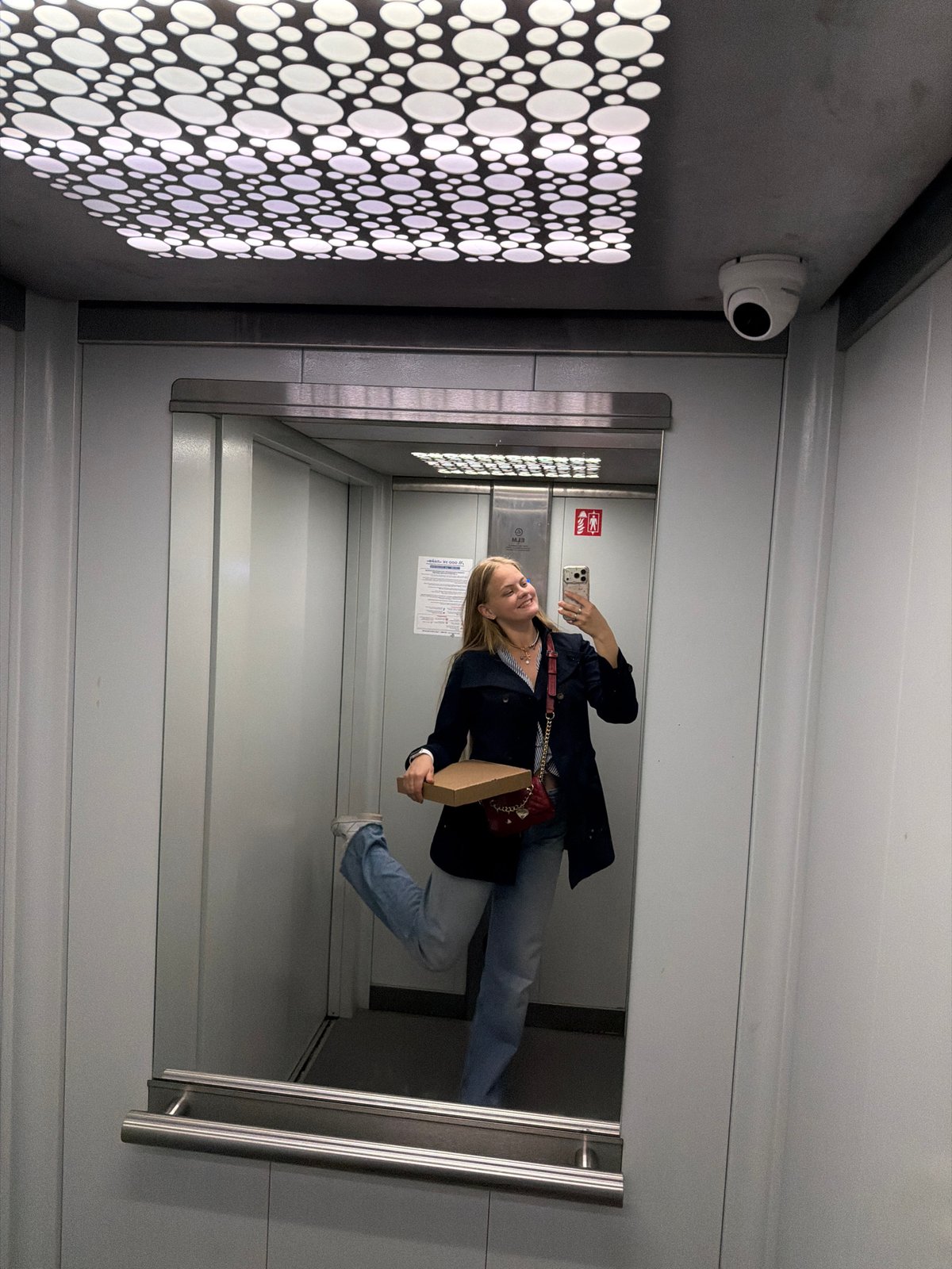 Personal moments documented in Izhevsk elevator and floral arrangement