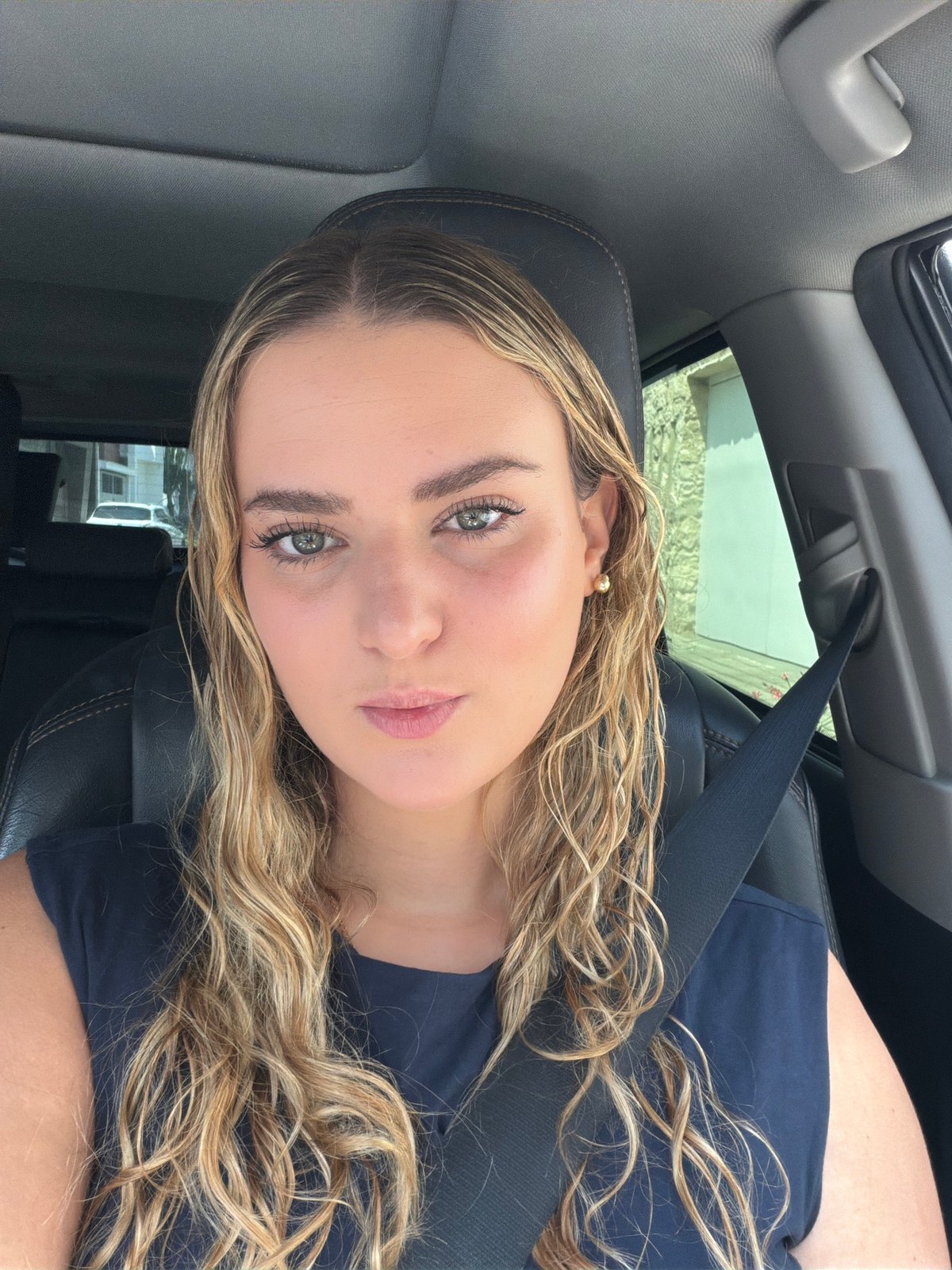 Woman photographed in driver's seat in Tlaxcalancingo, Mexico
