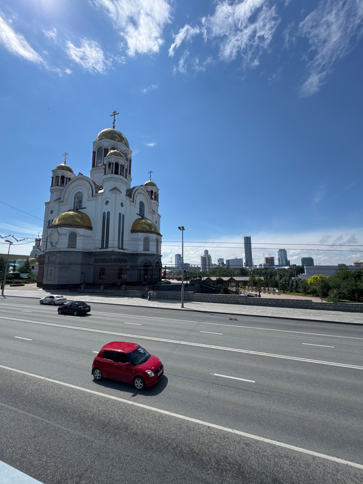 Church on Blood and city scenes across a sunny Yekaterinburg morning