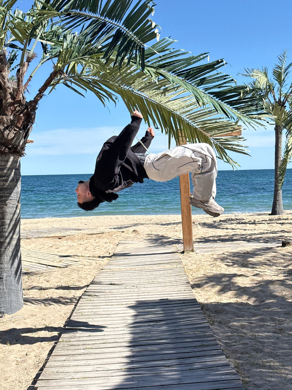 Acrobat performs beach stunts in sunny Varna, Bulgaria