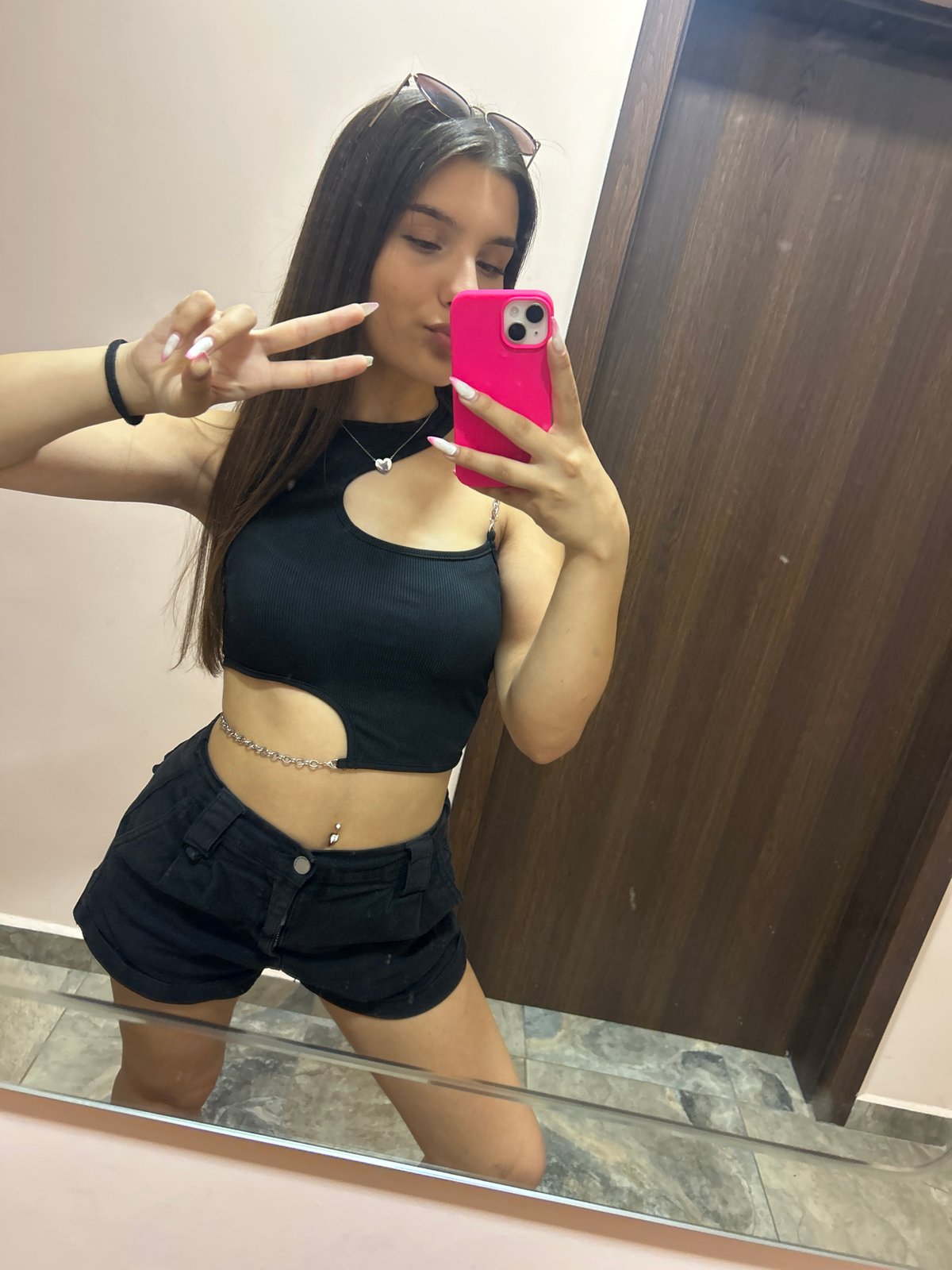 Mirror selfie series in Shumen, black crop top and chain accessory