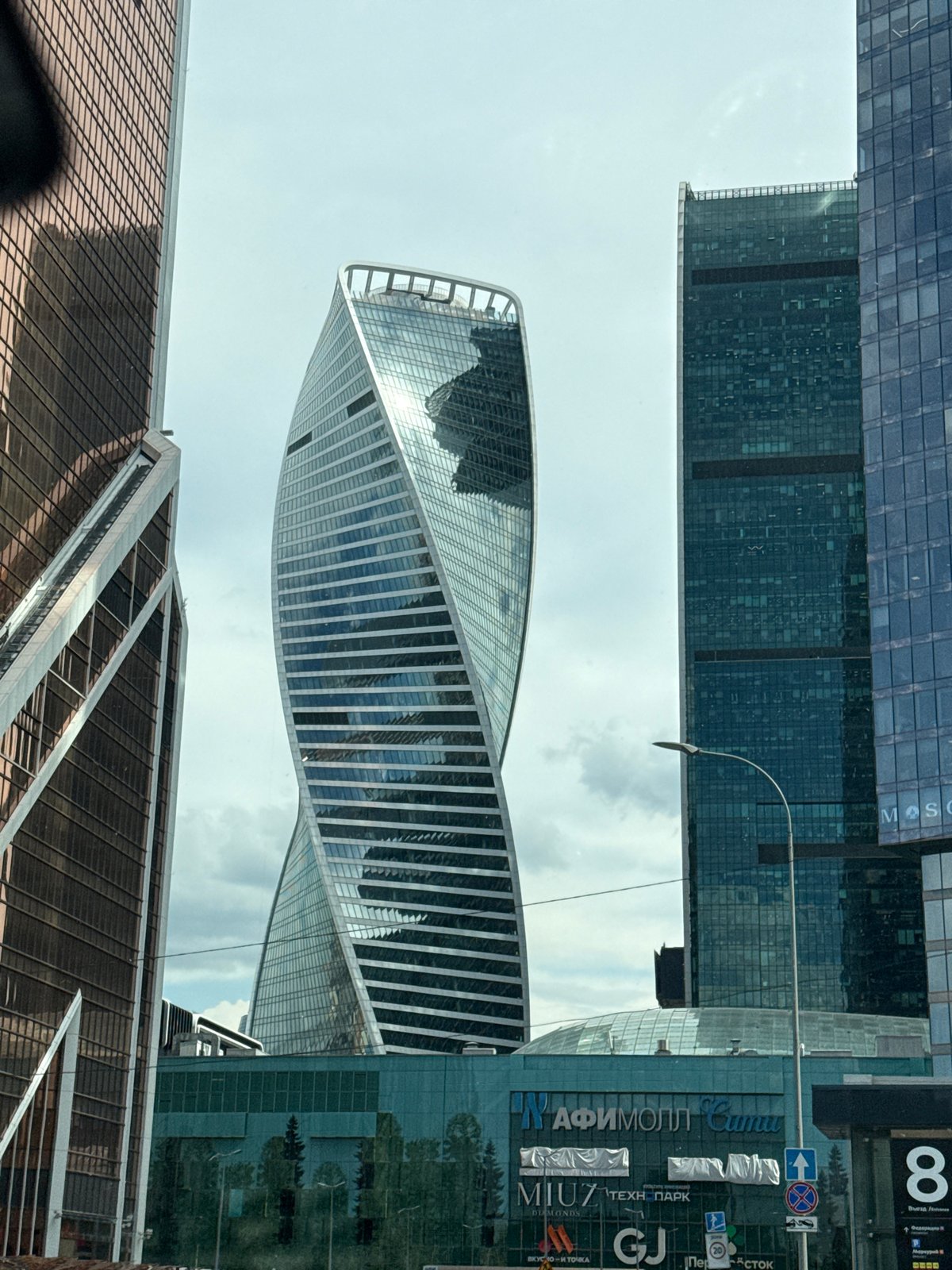 Moscow skyline with Evolution Tower photographed under overcast sky