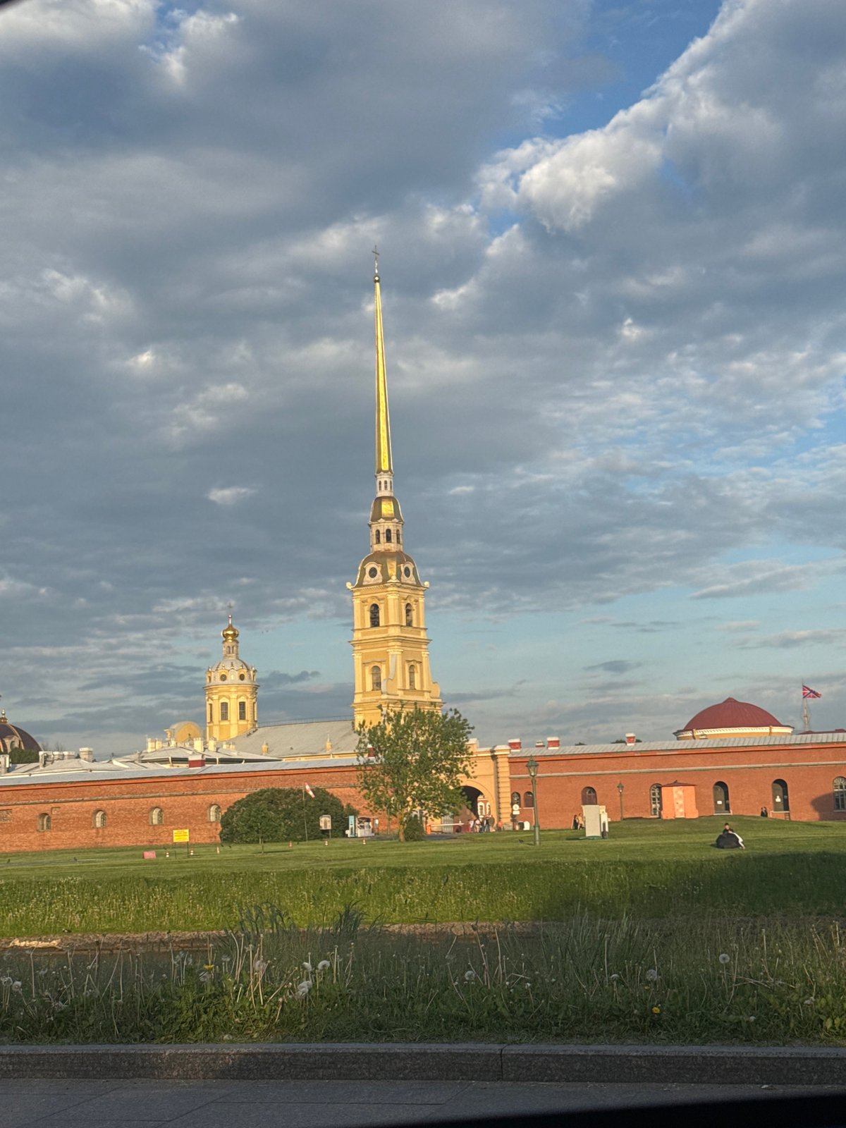 Tourist photographs Peter and Paul Cathedral in Saint Petersburg
