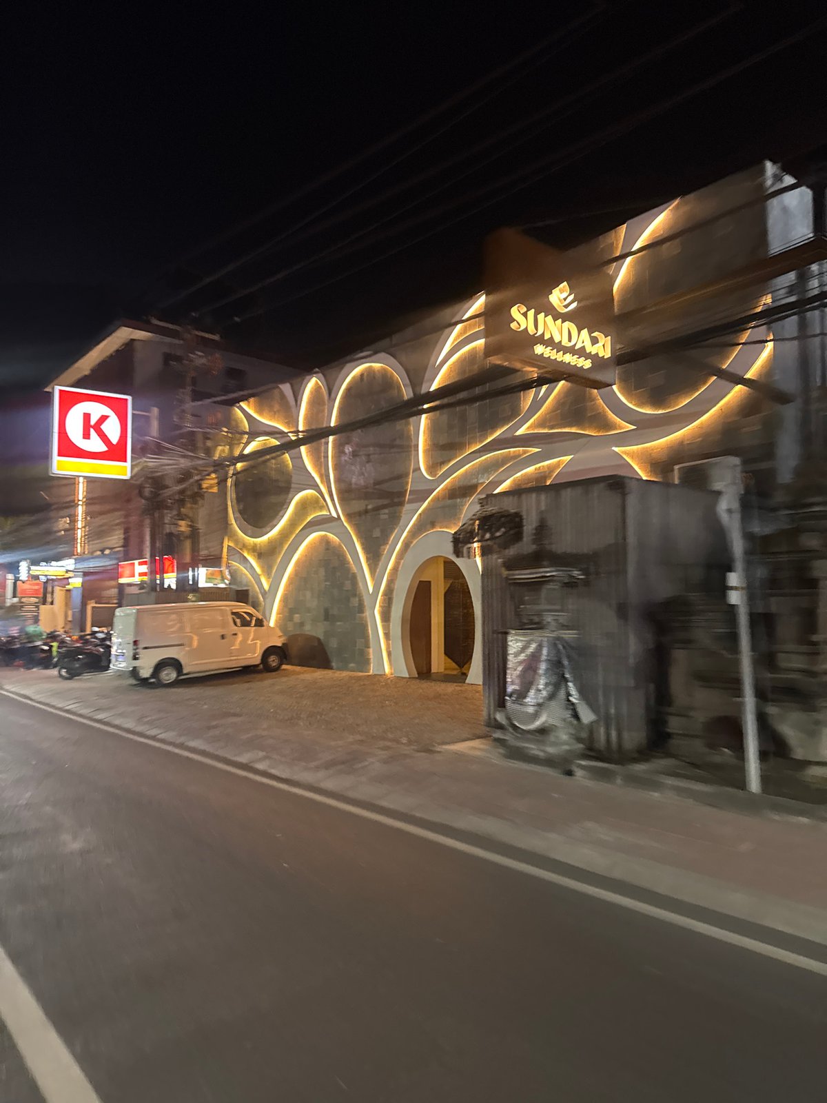 North Kuta bar strip at night, inside and out
