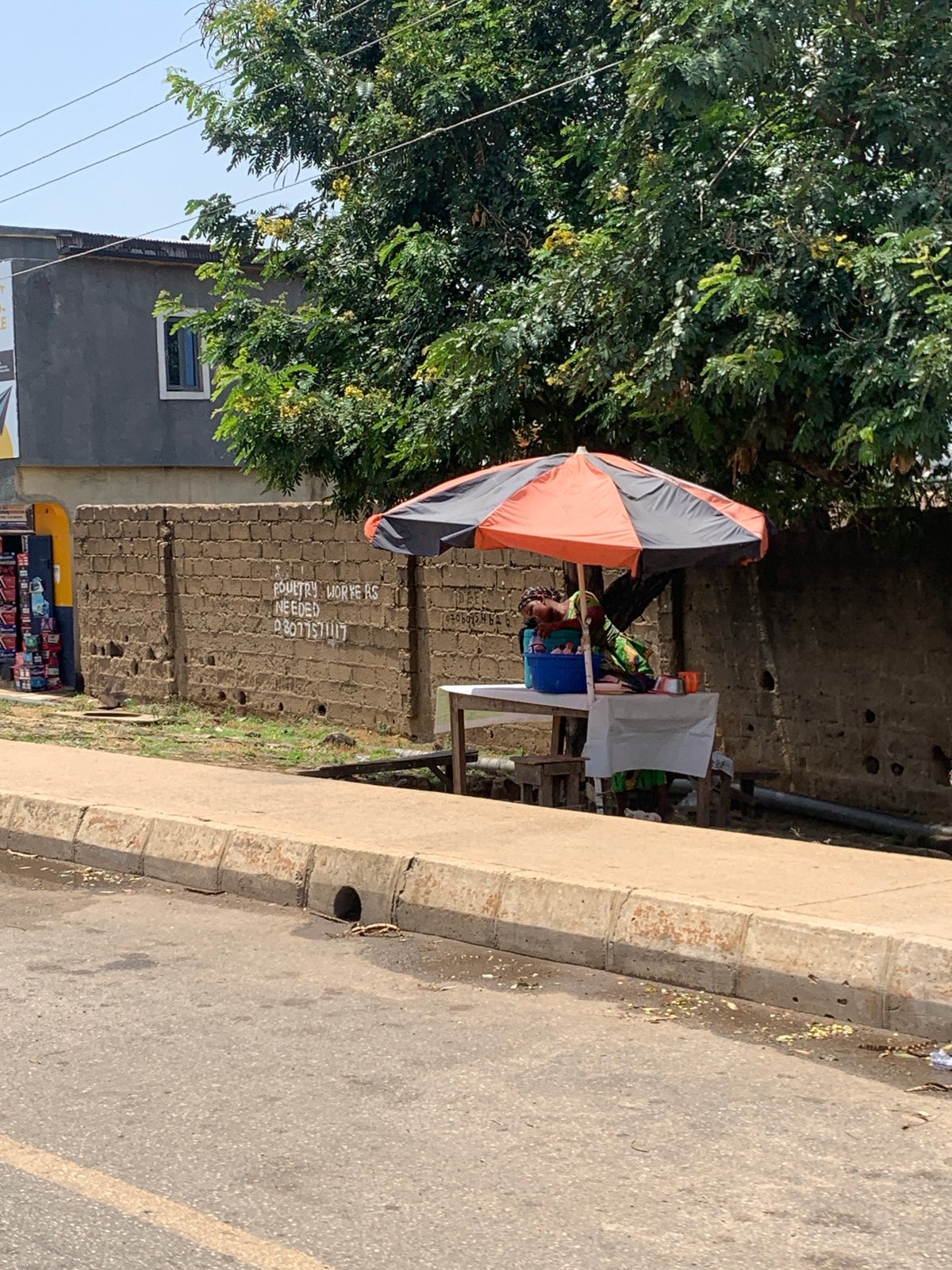 Daily street life documented across Jos Nigeria neighborhoods