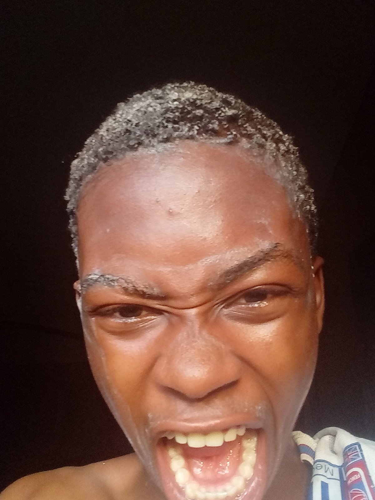 Traditional face painting ceremony documented in Nkpor, Nigeria