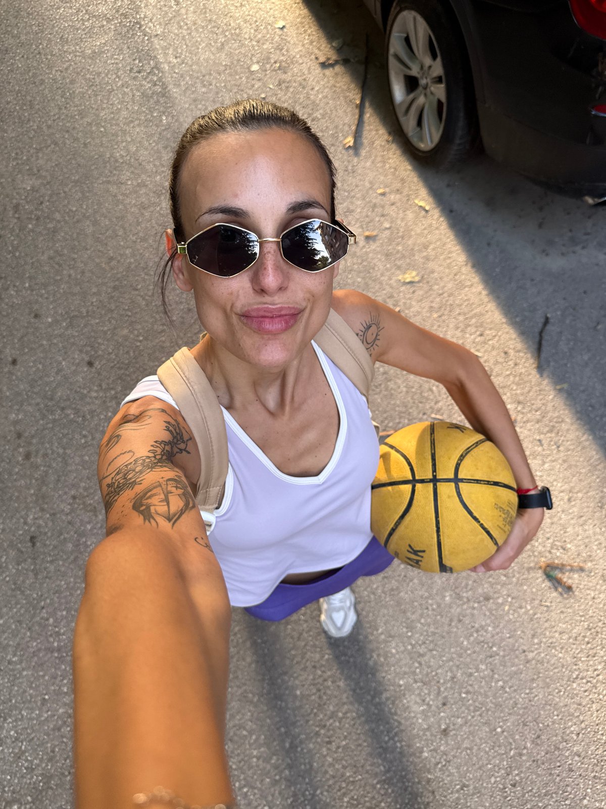 Woman photographed with basketball and flowers in Pleven